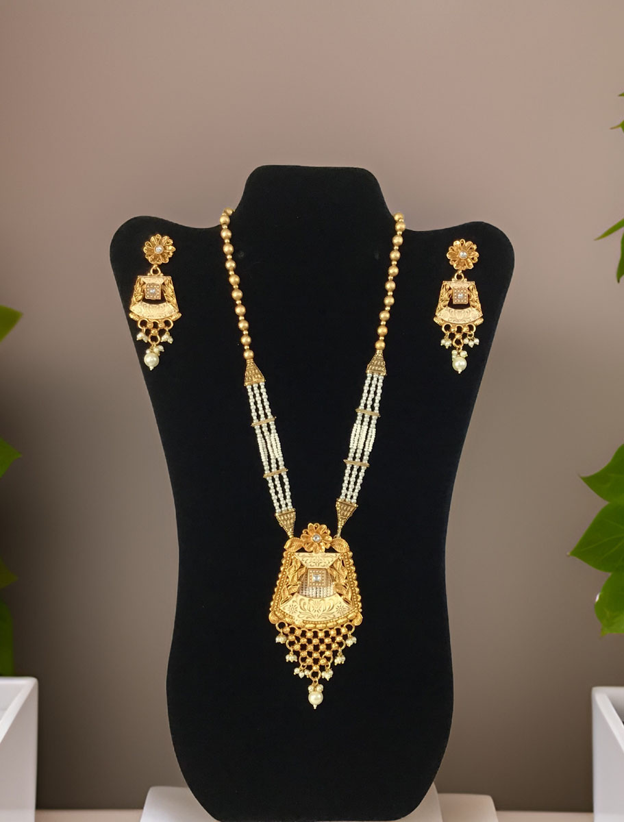 Gold Finish Rajwadi Long necklace set with pearl drops