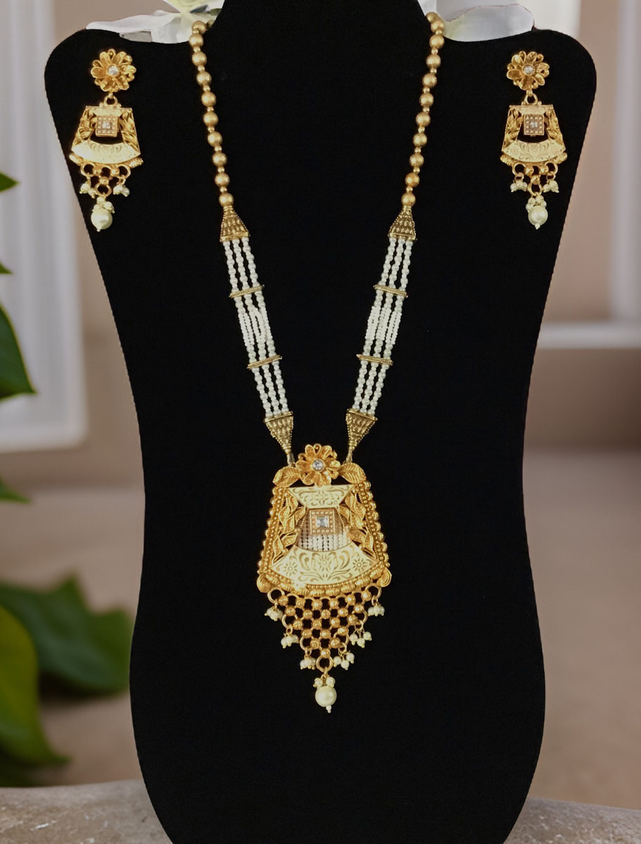 Gold Finish Rajwadi Long necklace set with pearl drops