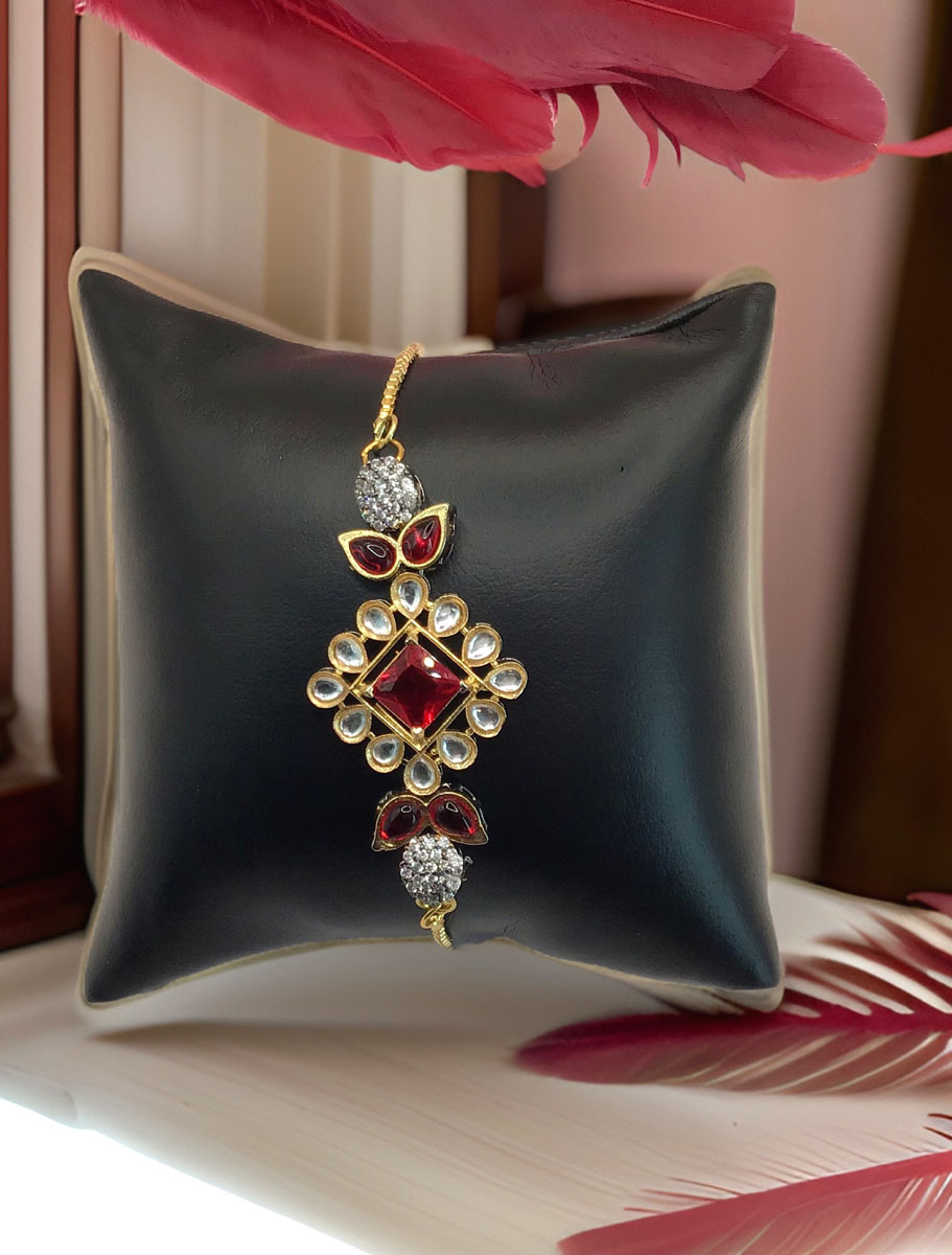 Delicate Kundan Rakhi Bracelet in Gold Polish