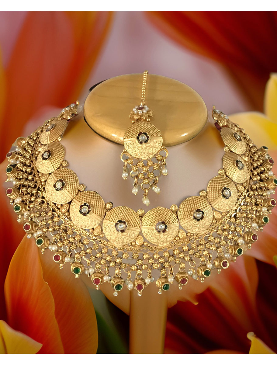 Beautifully Crafted Rajputi Style Gold plated Coin Shaped Choker Set with maangtika