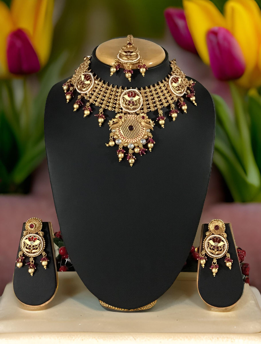 Antique gold finish rajwadi meenakari choker set with maangtika