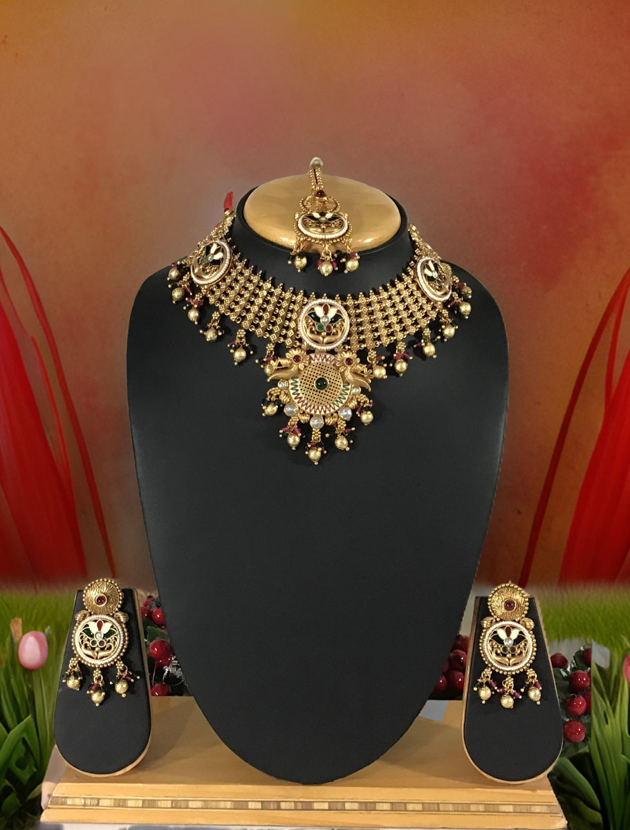 Antique gold finish rajwadi meenakari choker set with maangtika