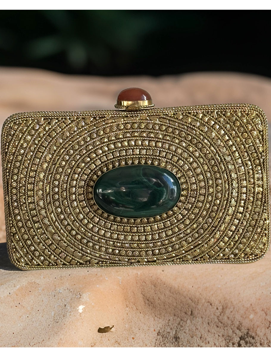 Matt Gold Intricate Designer Clutch with an Emerald Stone