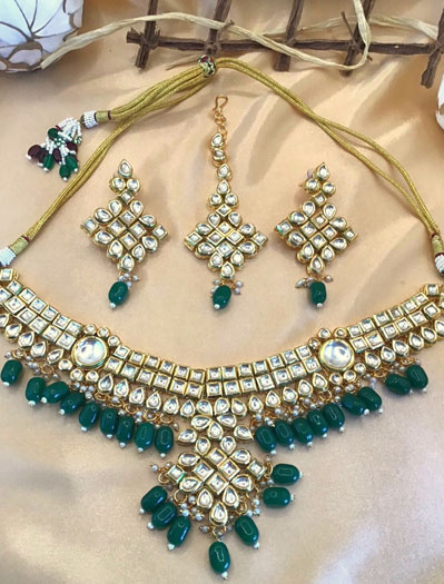 Premium Kundan choker set with green onyx beads