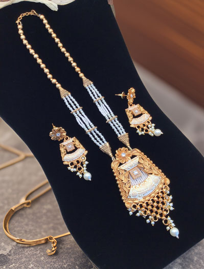 Gold Finish Rajwadi Long necklace set with pearl drops