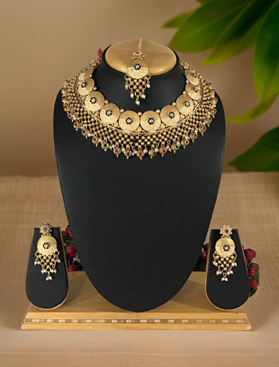 Beautifully Crafted Rajputi Style Gold plated Coin Shaped Choker Set with maangtika