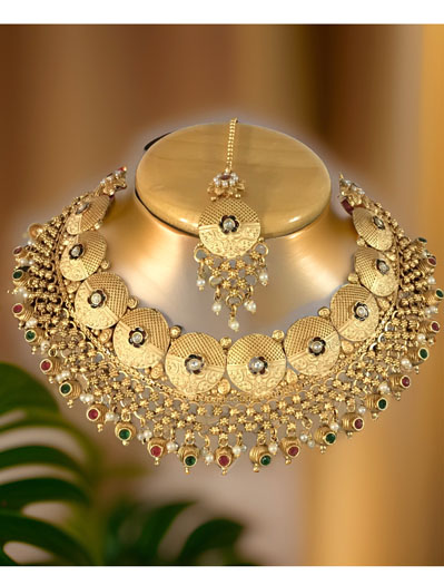 Beautifully Crafted Rajputi Style Gold plated Coin Shaped Choker Set with maangtika