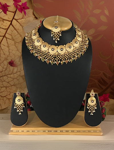 Beautifully Crafted Rajputi Style Gold plated Coin Shaped Choker Set with maangtika