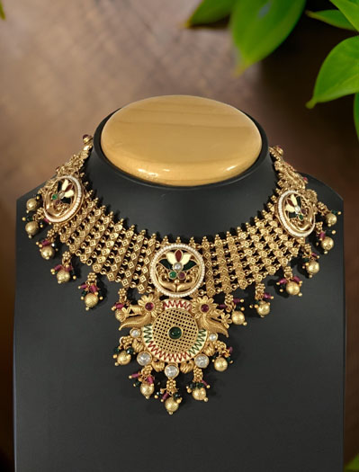 Antique gold finish rajwadi meenakari choker set with maangtika