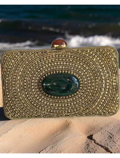 Matt Gold Intricate Designer Clutch with an Emerald Stone