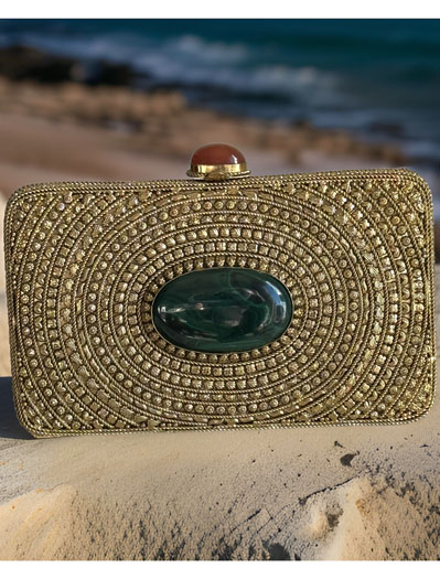 Matt Gold Intricate Designer Clutch with an Emerald Stone