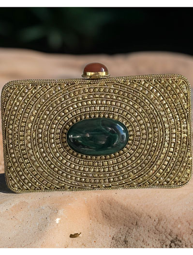 Matt Gold Intricate Designer Clutch with an Emerald Stone