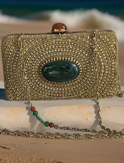 Matt Gold Intricate Designer Clutch with an Emerald Stone