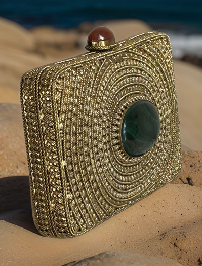 Matt Gold Intricate Designer Clutch with an Emerald Stone