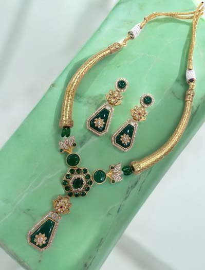 Amrapali Inspired Emerald Golden Hasli Set