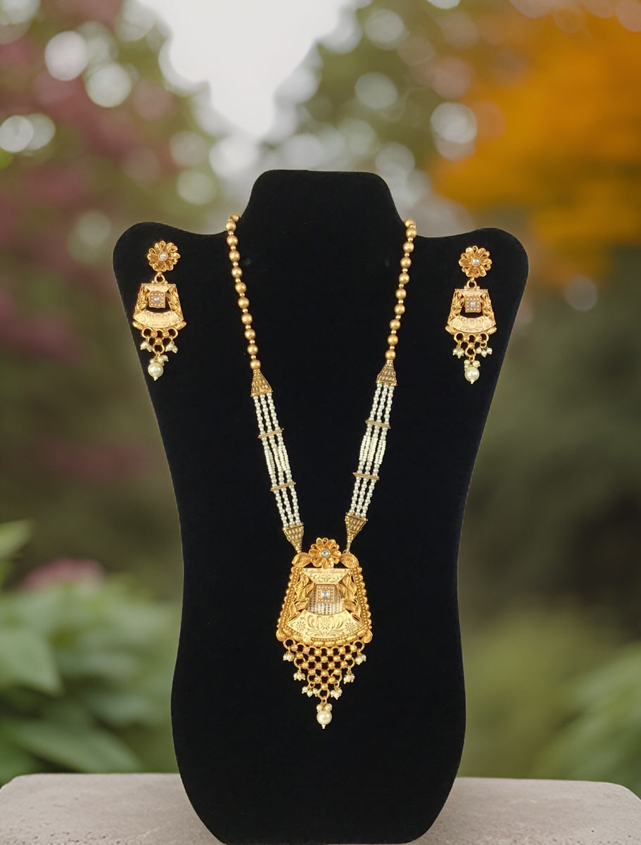 Gold Finish Rajwadi Long necklace set with pearl drops