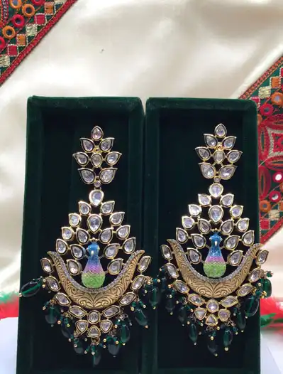 Fancy Peacock Kundan Long Earrings