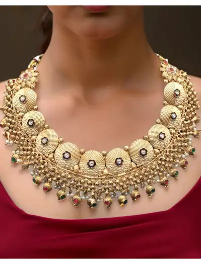 Beautifully Crafted Rajputi Style Gold plated Coin Shaped Choker Set with maangtika